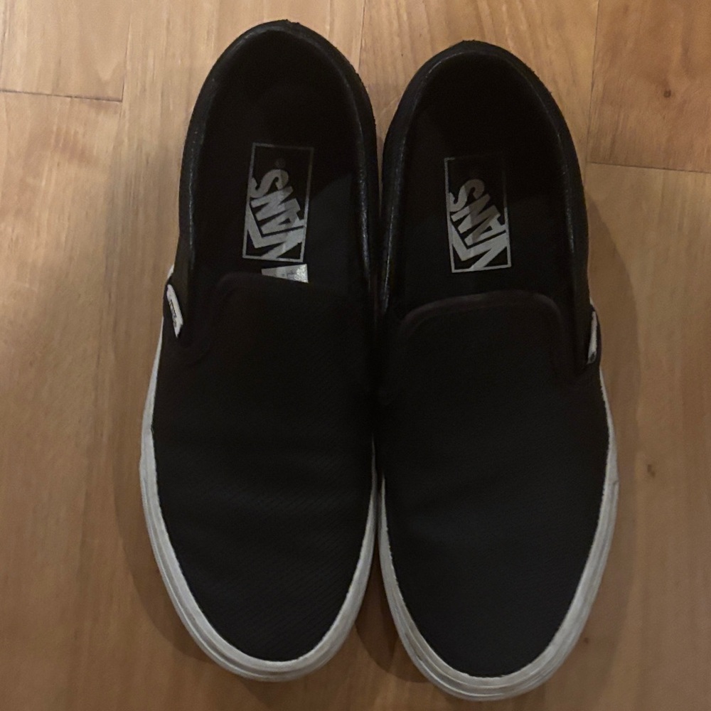 Vans women size 7.5. Black. Definitely worn!